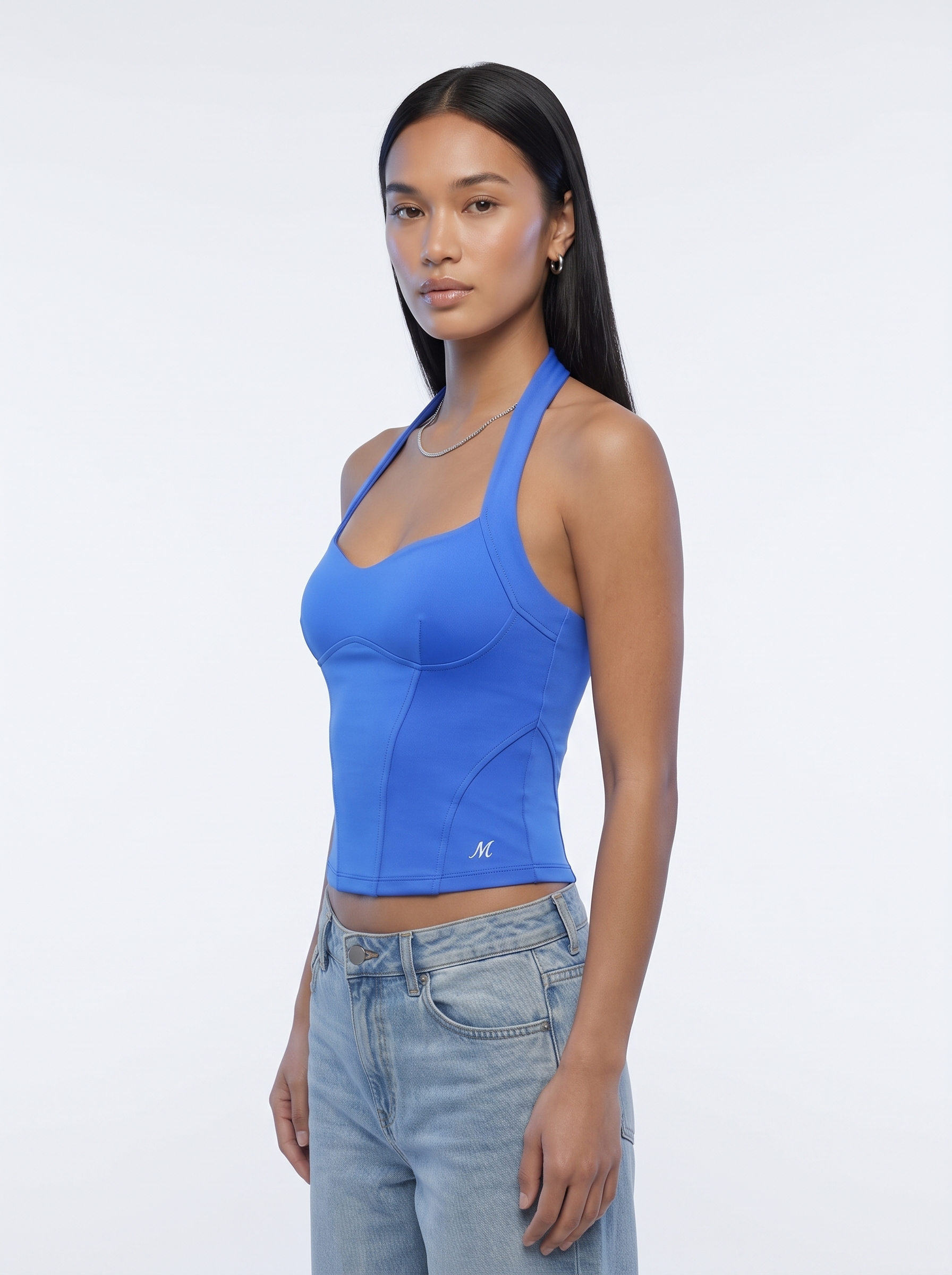 Woman wearing a blue Miravel top